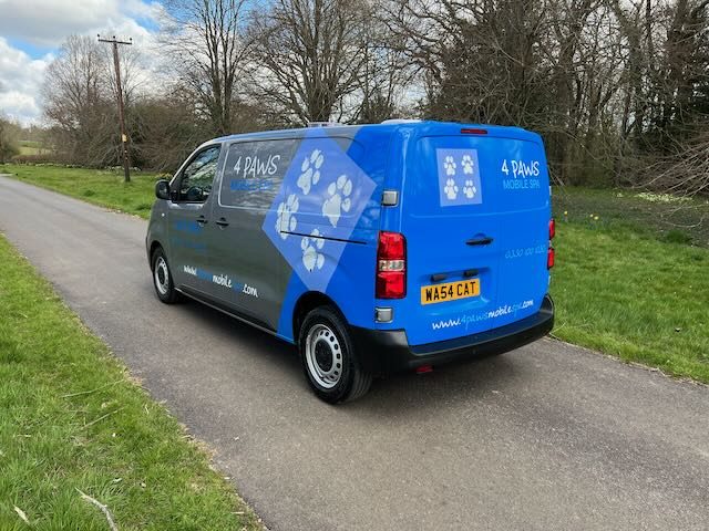 Rear view of a 4 Paws Cat Spa van